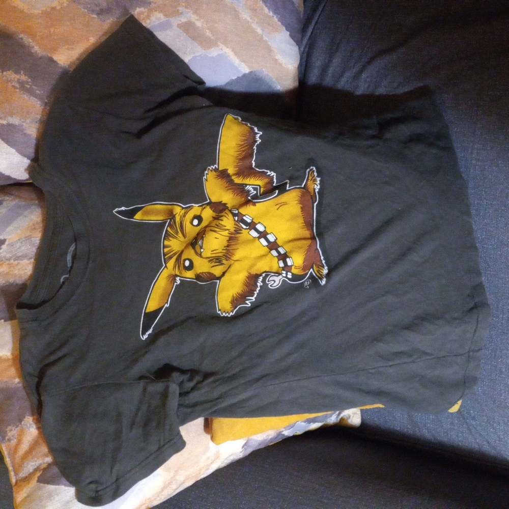 T shirt . Woman .clothing Brand pikachewie/pikachu tshirt. Midium  color grey.